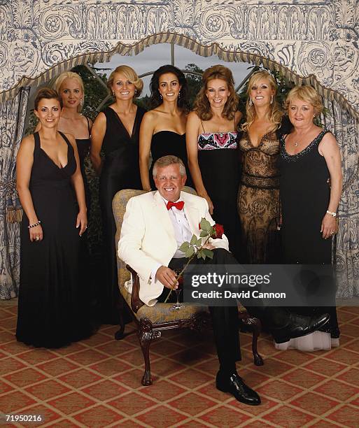 Colin Montgomerie poses with Laurae Westwood, Jocelyn Hefner, Morgan Norman, Diane Antonopoulos, Alison McGinley, Caroline Harrington and Glendryth...