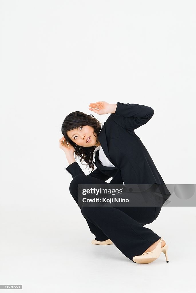 Young woman ducking