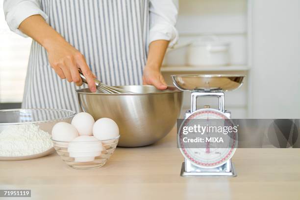 woman cooking - kitchen scale stock pictures, royalty-free photos & images