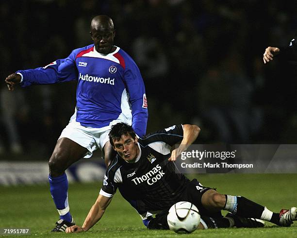 Paul Hall of Chesterfield tangles with Stephen Jordan of Manchester City during the Carling Cup 2nd round match between Chesterfied and Manchester...