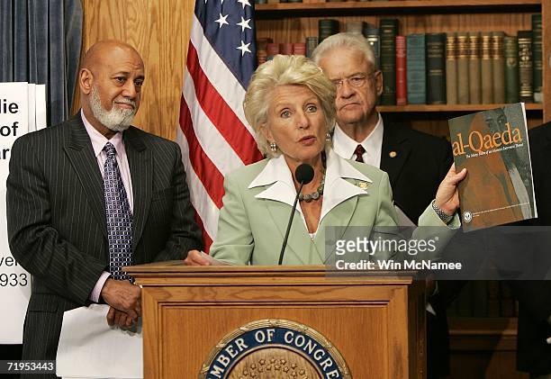 Rep. Jane Harman , ranking member of the House Intelligence Committee, displays a report on al-Qaeda produced by the committee during a news...