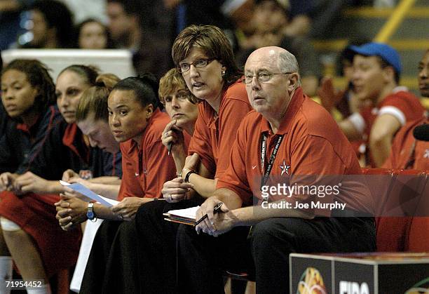 Mike Thibault, USA assistant coach, Anne Donovan, USA head coach, Gail Goestenkors, USA assistant coach and Dawn Staley, USA assistant coach watch...
