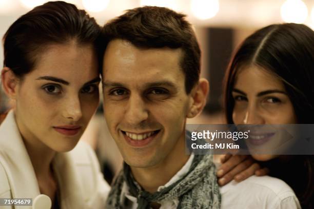 Designer Marios Schwab and models pose the backstage during the Marios Schwab Fashion show as part of London Fashion Week Spring/Summer 2007 in The...