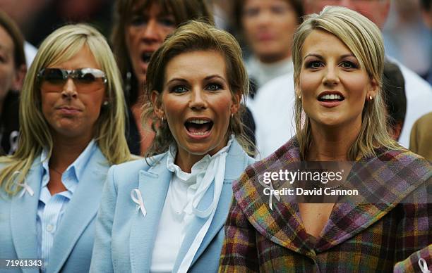 Alison McGinley reacts as Caroline Harrington and Henrik Stenson's girlfriend Emma Lofgren look on during the Opening Ceremony of the 2006 Ryder Cup...