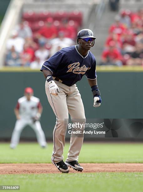 Mike Cameron of the San Diego Padres leads off base against the Cincinnati Reds at Great American Ball Park September 14, 2006 in Cincinnati, Ohio....