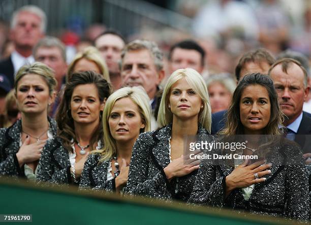 Amy Campbell ,Tabitha Furyk, Amy Mickelson, Elin Woods and Melissa Lehman observe their country's national anthem during the Opening Ceremony of the...