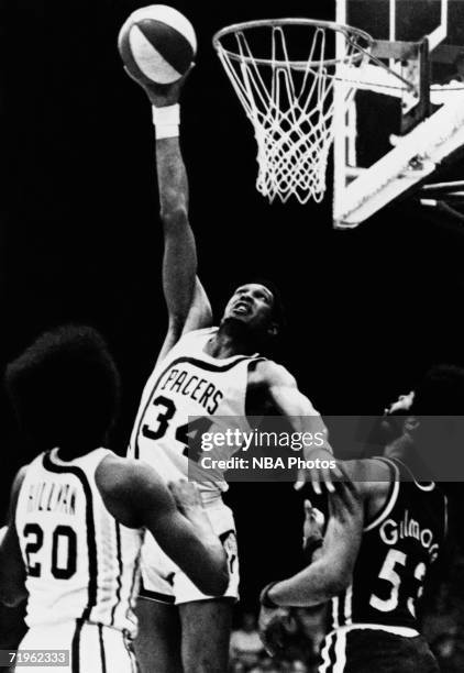 Mel Daniels of the Indiana Pacers shoots a hook shot during a game played in 1968 at Market Square Arena in Indianapolis, Indiana. NOTE TO USER: User...