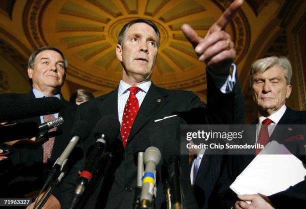 House Armed Services Committee Chairman Duncan Hunder , Senate Majority Leader Bill Frist and Senate Armed Services Committee Chairman John Warner...