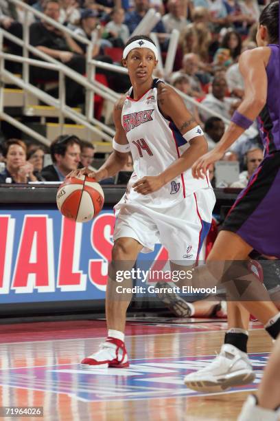 Deanna Nolan of the Detroit Shock dribbles the ball against the Sacramento Monarchs during Game Five of the WNBA Finals September 9, 2006 at Joe...