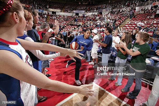 Kedra Holland-Corn the Detroit Shock enters the court before taking on the Sacramento Monarchs in Game Five of the WNBA Finals September 9, 2006 at...