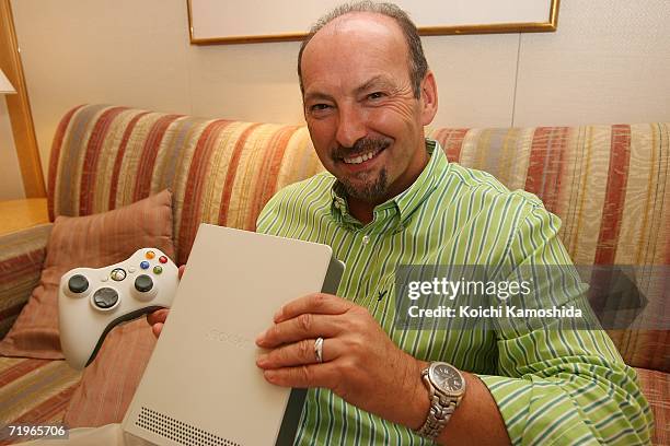 Peter Moore, Vice President of Microsoft Corporation shows the Xbox 360 game console on September 22, 2006 in Chiba Prefecture, Japan. Microsoft will...