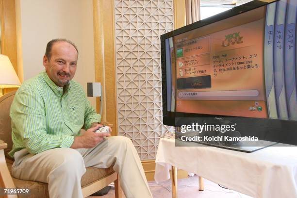 Peter Moore, Vice President of Microsoft Corporation shows the Xbox 360 game console on September 22, 2006 in Chiba Prefecture, Japan. Microsoft will...