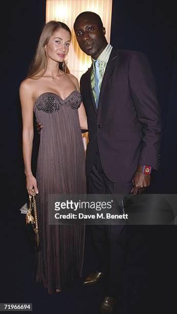 Ozwald Boateng with wife Guynel attend the fashion show and party to celebrate the launch of Emporio Armani RED collection, at Earls Court on...
