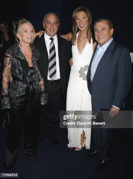 Tina and Philip Green with Heather and Sol Kerzner attend the fashion show and party to celebrate the launch of Emporio Armani RED collection, at...