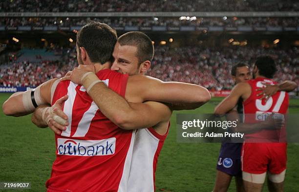 Tadhg Kennelly and Nick Malceski of the Swans celebrate after the winning the First Preliminary AFL final between the Sydney Swans and the Fremantle...