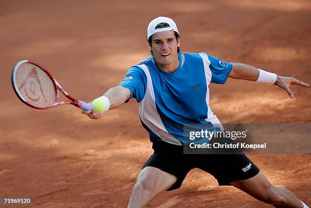 Tommy Haas of Germany plays a forehand against Danai Udomchoke of Thailand during the Davis Cup Play Off game between Germany and Thailand at the...