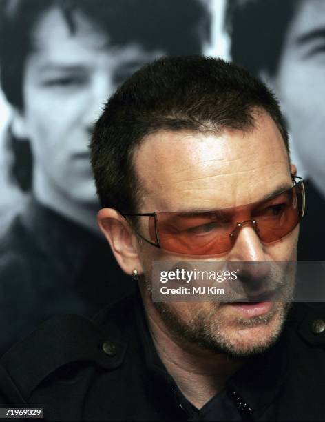 Bono of rock group U2 appears at a signing of their new book "U2 by U2" at Waterstone?s Piccadilly on September 22, 2006 in London, England.