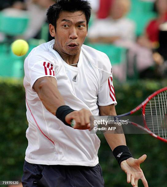 Paradorn Srichaphan of Thailand returns a shot to Florian Mayer of Germany during their 2006 Davis Cup play-off's match at the Rochus Club in...