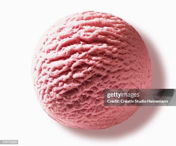 scoop of strawberry ice cream, close-up - handful stock pictures, royalty-free photos & images