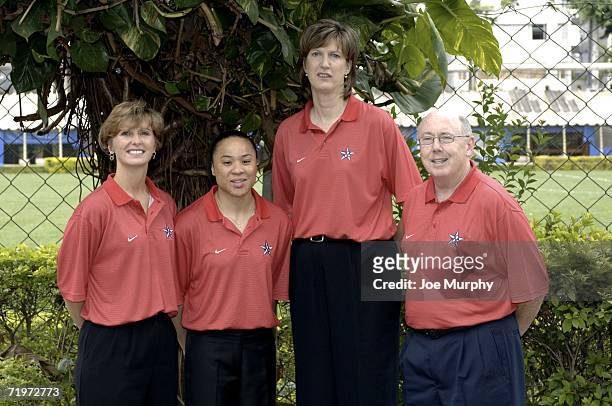 Gail Goestenkors assistant coach, Dawn Staley assistant coach, Anne Donovan head coach, and Mike Thibault assistant coach, pose during a portrait...