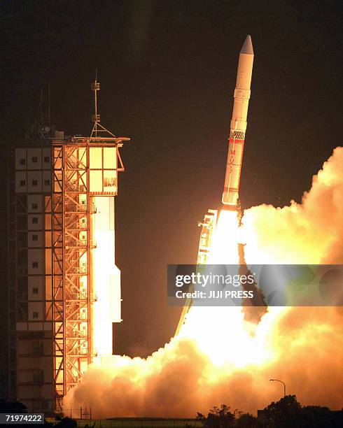 The M-5 solid-fuel rocket carrying the Solar-B satellite lift off from the Uchinoura Space Center, Kagoshima prefecture, 23 September 2006. Japan put...