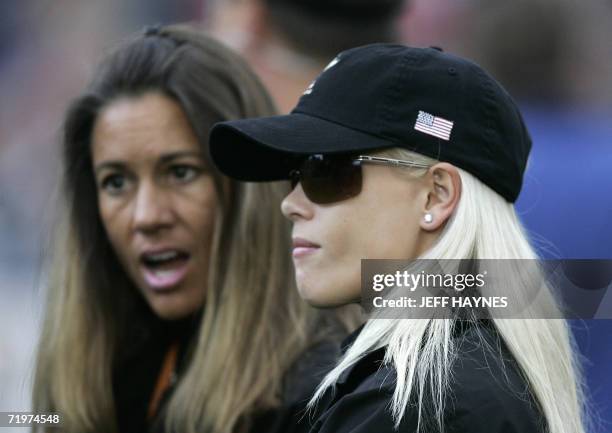 Elin Woods, wife of United States Ryder Cup player Tiger Woods, talks with Melissa Lehman, wife of U.S. Ryder Cup captain Tom Lehman, during the...