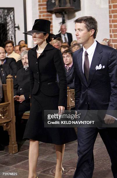 Danish Crown Prince Frederik and Crown Princess Mary arrive at the Roskilde Cathedral 23 September 2006 at the begining of a re-burial ceremony of...