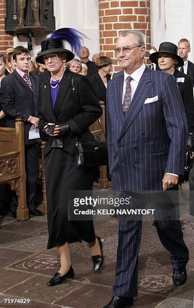 Danish Queen Margrethe and Prince Consort Hanrik arrive at the Roskilde Cathedral 23 September 2006 at the begining of a re-burial ceremony of Danish...