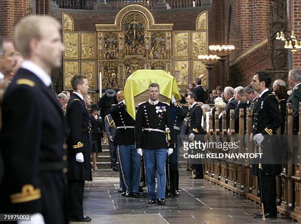 Soldiers of the Royal Danish Guard and the Russian Presidential Guard carry the sarcophagus of Danish Princess Dagmar, who later took the name of...