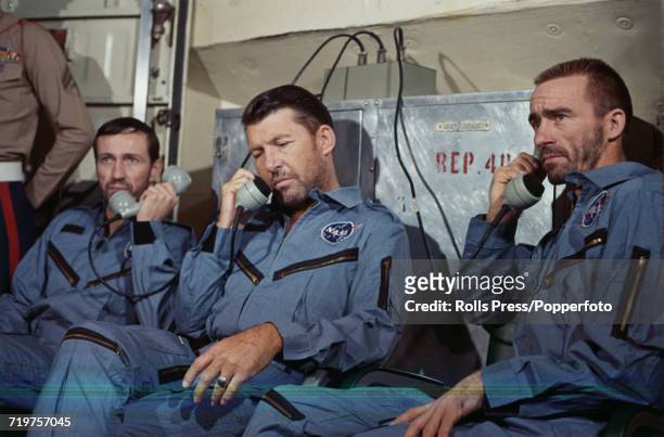 American astronauts and crew of the Apollo 7 mission, from left, Command Module pilot Donn F Eisele , Commander Wally Schirra and Lunar Module pilot...