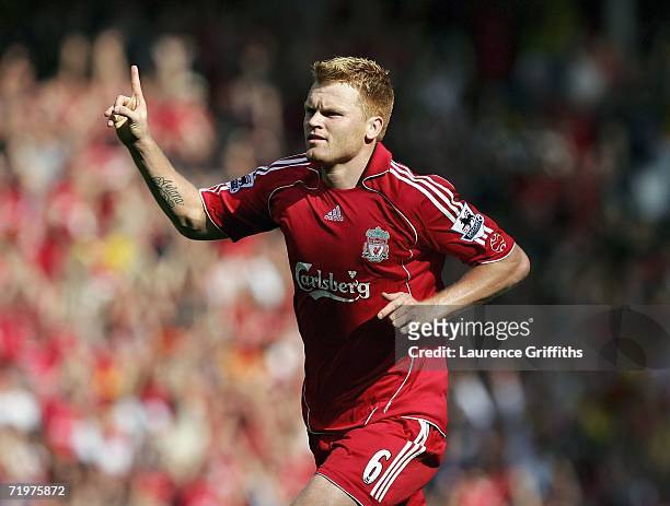 John Arne Riise of Liverpool celebrates the third goal during the Barclays Premiership match between Liverpool and Tottenham Hotspur at Anfield on...