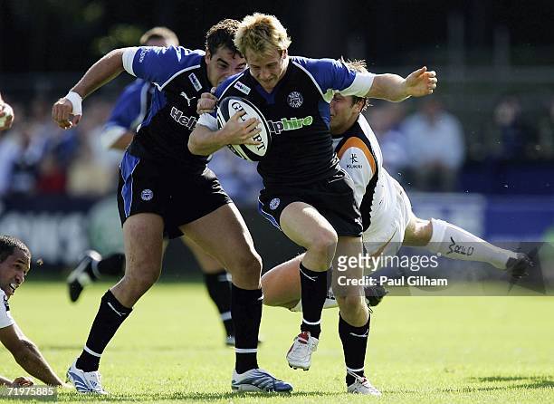 Nick Abendanon of Bath is tackled by Lee Best of Worcester Warriors during the Guinness Premiership match between Bath and Worcester Warriors at The...
