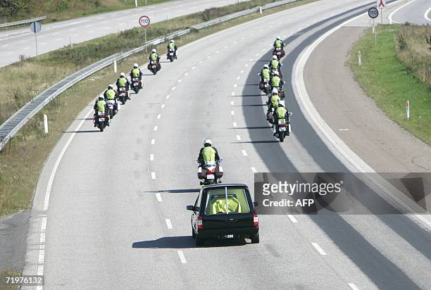 Police motorcyclists escort the coffin of Danish Princess Dagmar, who later took the name of Maria Fyodorovna Romanova , when converting to the...