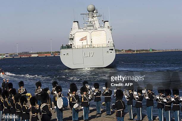 Accompaniment by the band of the Royal Danish Guard, a vessel of the Royal Danish Marine leaves the Copenhagen Harbour carrying the coffin of Danish...