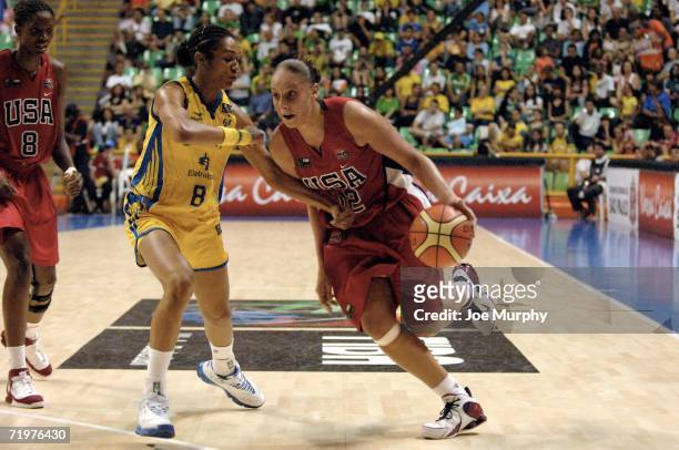 Diana Taurasi of USA drives past Iziane Marques of Brazil during the bronze medal game between USA and Brazil during the 2006 FIBA World Championship...