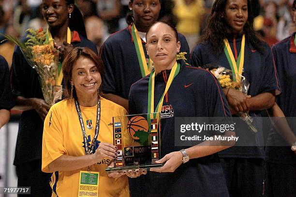 Diana Taurasi of USA receives her trophy on the medal stand after the gold medal game between Australia and Russia during the 2006 FIBA World...