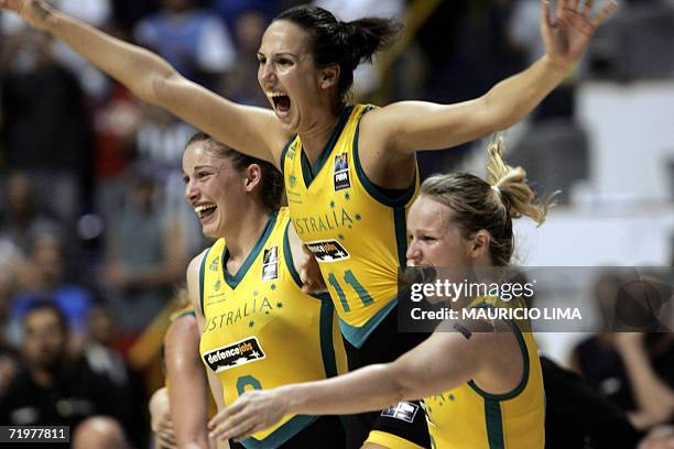Australia's Laura Summerton Hollie Grima and Jennifer Screen celebrate their victory 91-74 over Russia at the FIBA World Championship for Women...