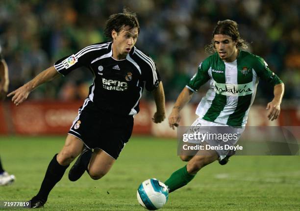 Antonio Cassano of Real Madrid tries to get past Alberto Rivera of Real Betis during the Primera Liga match between Real Betis and Real Madrid at the...