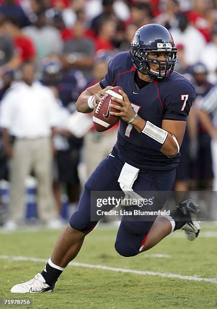 Quarterback Willie Tuitama of the Arizona Wildcats drops back to pass in the first half against the USC Trojans during the game at Arizona Stadium on...