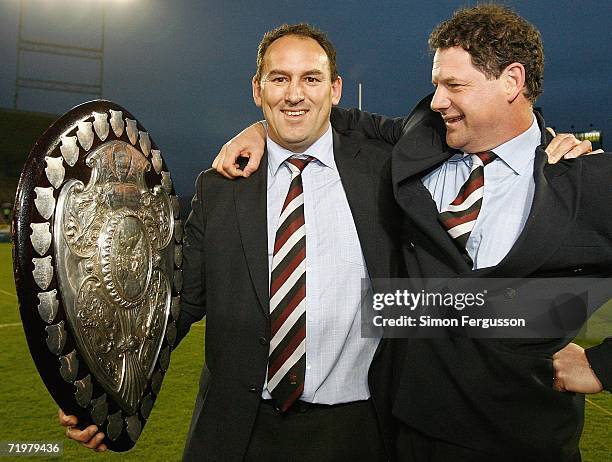 North Harbour assistant coach Milan Yelavich and coach Allan Pollock hold the Ranfurly Shield after the Air New Zealand Cup match between Canterbury...