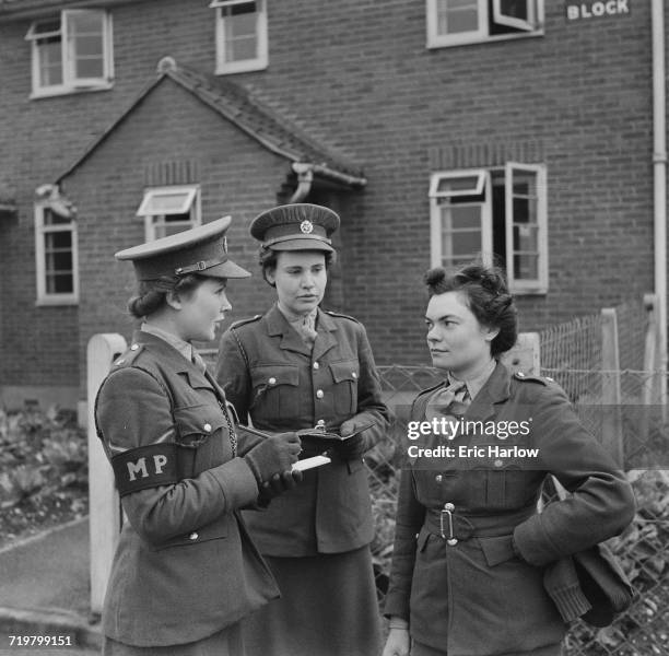 Year-old Military Policewoman, Gladys Overthrow of the Auxiliary Territorial Service on patrol at a UK barracks, 24th February 1943. Overthrow, from...