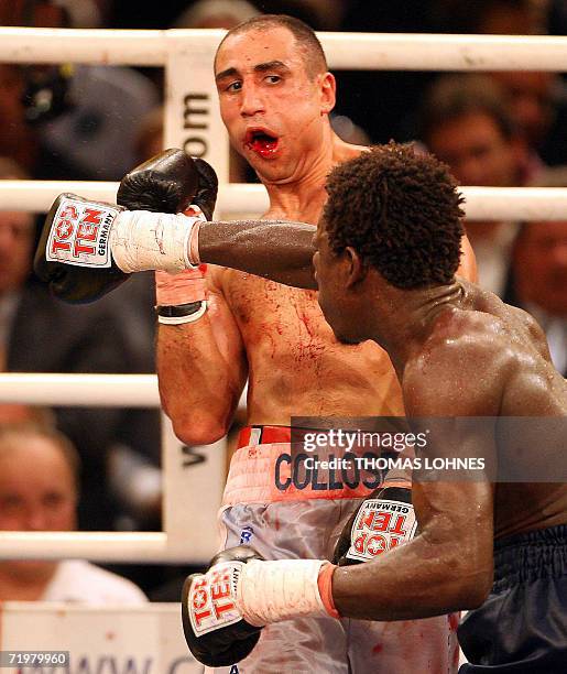 Germany's Armenian-born Arthur Abraham fights against Colombia's Edison Miranda late 23 September 2006 at the Rittal Arena in Wetzlar. IBF...