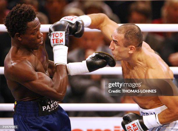 Germany's Armenian-born Arthur Abraham fights against Colombia's Edison Miranda late 23 September 2006 at the Rittal Arena in Wetzlar. IBF...