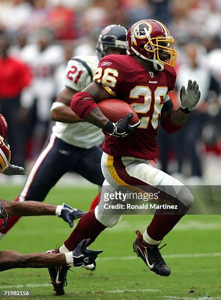 Running back Clinton Portis of the Washington Redskins runs for a touchdown against the Houston Texans on September 24, 2006 at Reliant Stadium in...