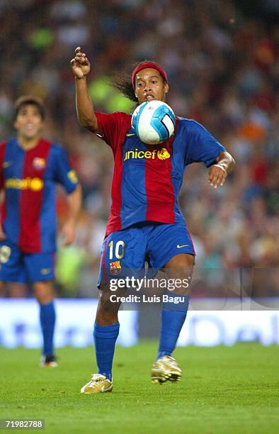 Ronaldinho of Barcelona is seen in action during the match between FC Barcelona and Valencia, of La Liga, on September 2006, played at the Camp Nou...