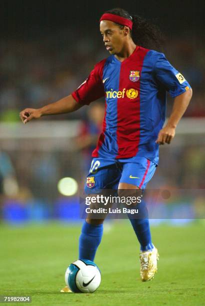 Ronaldinho of Barcelona runs in action during the match between FC Barcelona and Valencia, of La Liga, on September 2006, played at the Camp Nou...