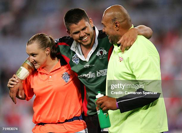 Fred Briggs of the Bulls smiles as his helped from the field by trainers during the Jim Beam Cup Grand Final match between the Sydney Bulls and the...