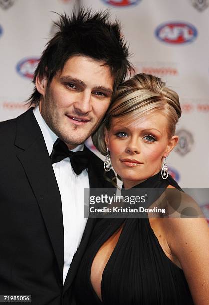 Brendan Fevola of the Carlton Blues and his wife Alex Fevola arrive for the 2006 AFL Brownlow Medal Dinner at Crown Casino September 25, 2006 in...
