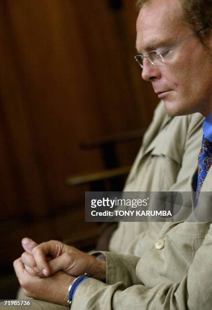 Thomas Cholmondeley, the son of one of Kenya's most celebrated aristocratic British settler families sits at court at the begining of his trial for...