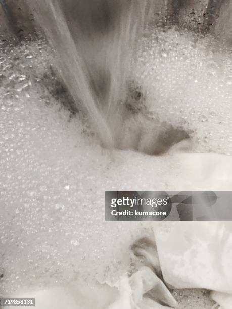 water - washing machine with bubbles stock pictures, royalty-free photos & images